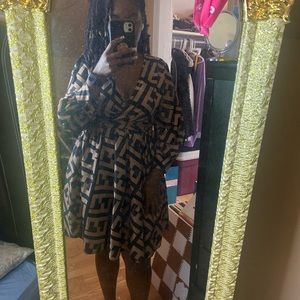 Custom fendi dress from boutique 

Size: M